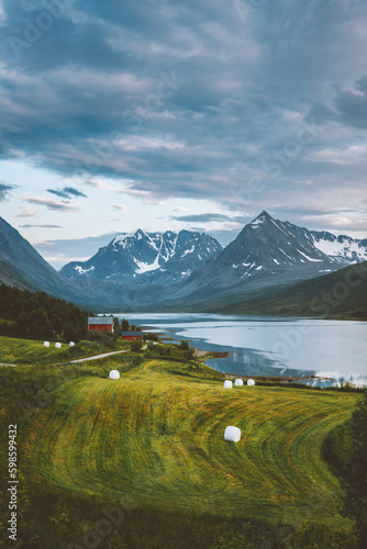 Norway landscape Lyngen Alps mountains and village rural scandinavian nature travel beautiful destinations .