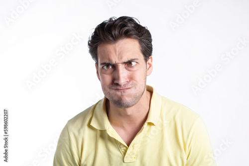 Close up portrait of funny stressed man isolated on white background 