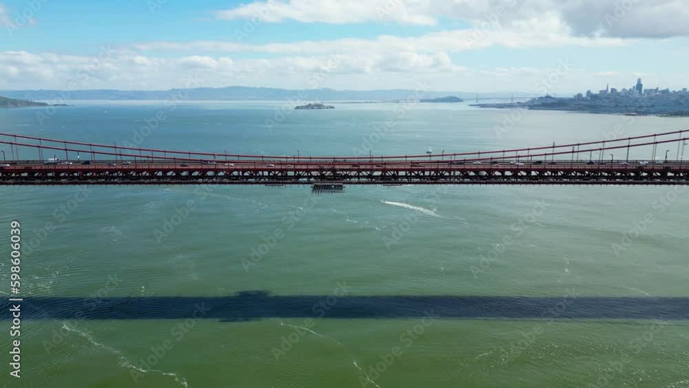 Golden Gate Bridge, California, USA 2023 - Flying backwards from middle of the bridge all the way out Golden Gate Bridge, California, USA 2023 - Flying backwards from middle of the bridge all the way out