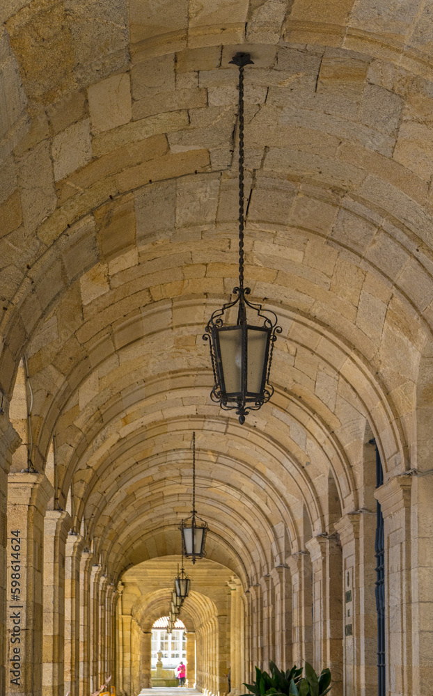 Santiago de Compostela, Galicia, Spain - April 4, 2023: Arches of the City Hall building in Obradoiro Square