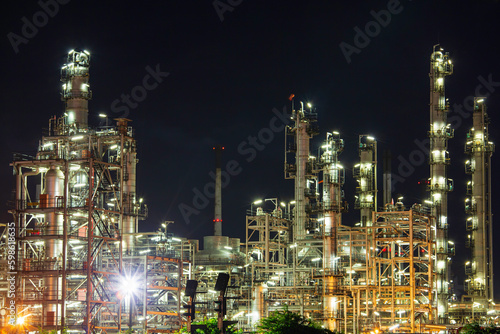 Oil​ refinery​ plant and tower column of Petrochemistry industry in tank oil​ and​ gas​ ​industrial with​ cloud​