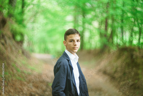 portrait of handsome young man outdoors