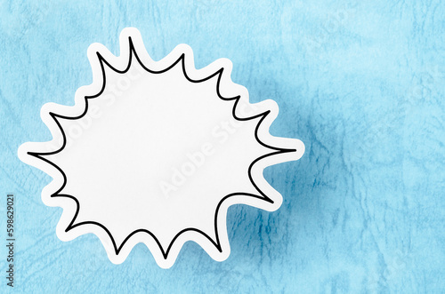 The Blank white speech bubble isolated on blue background.