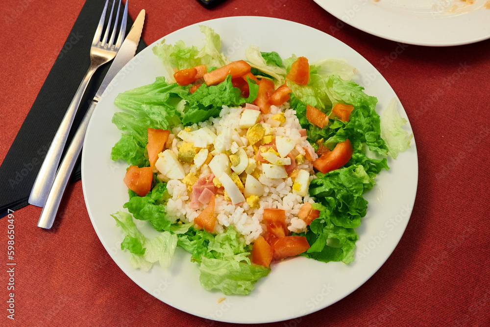 Salad with boiled egg, tomato rice and ham Salad with boiled egg, tomato rice and ham