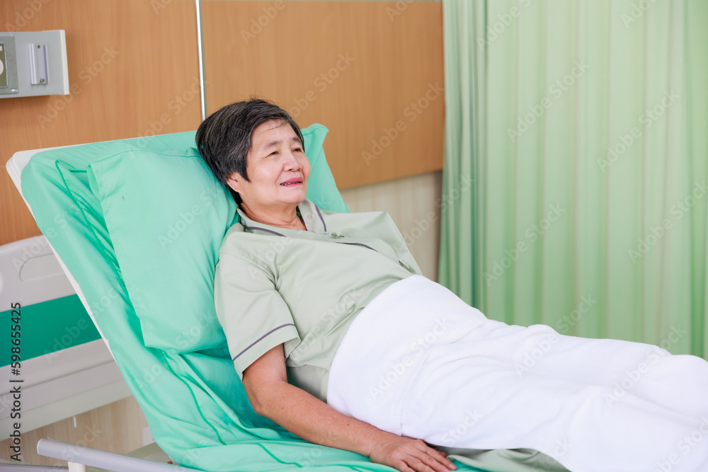 senior woman patient lying in bed at hospital ward. Healthcare medical and medicine concept. senior woman patient lying in bed at hospital ward. Healthcare medical and medicine concept.