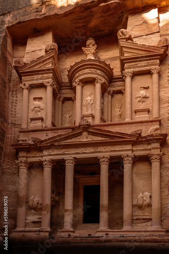 Ancient monument the Treasury in the ancient city of Petra carved in the sandstone on a sunny day