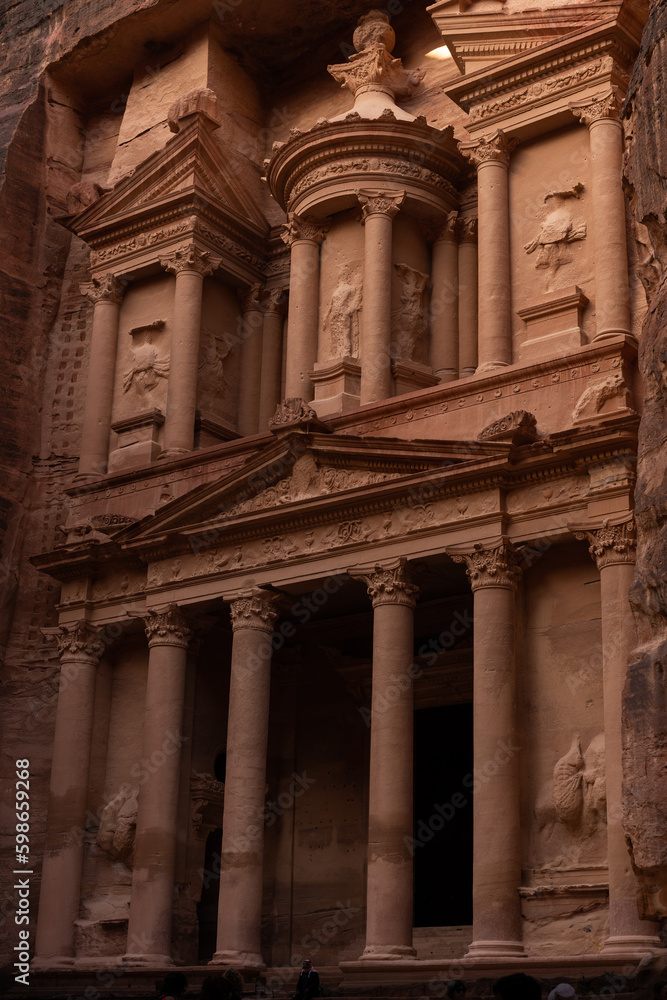 Ancient monument the Treasury in the ancient city of Petra carved in the sandstone on a sunny day