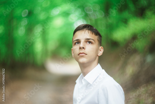 portrait of handsome young man outdoors