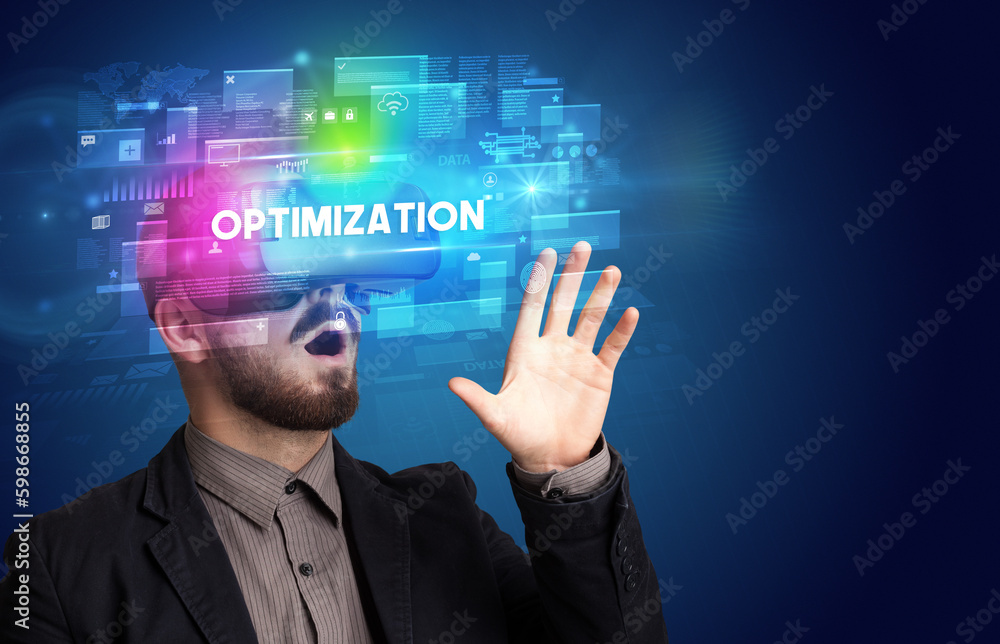 Businessman looking through Virtual Reality glasses Businessman looking through Virtual Reality glasses