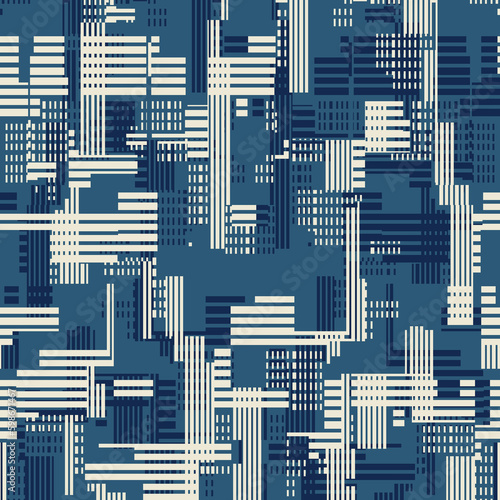 Tonal Blue and Beige Glitch Effect Textured Cityscape Pattern