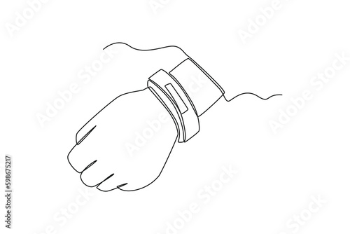 Continuous one line drawing muslim hand using e bracelets for security monitoring. Hajj and umrah concept. Single line draw design vector graphic illustration.