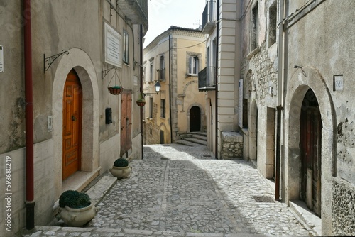 A narrow street among the old houses of Guardia Sanframondi  a small town of Benevento province  Italy.