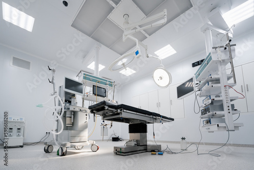 Empty operating room in a hospital Interior of an operating room in a clinic with modern medical equipment