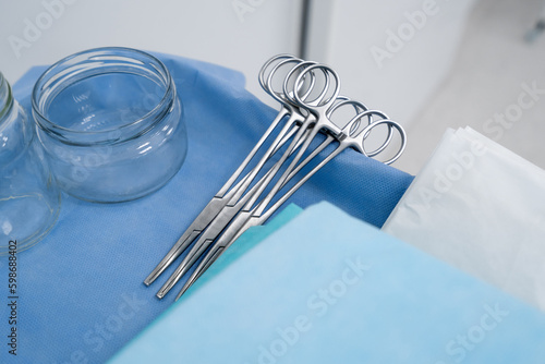 sterile surgical instruments lie on the table before the operation in the operating room laparoscope scalp scissors