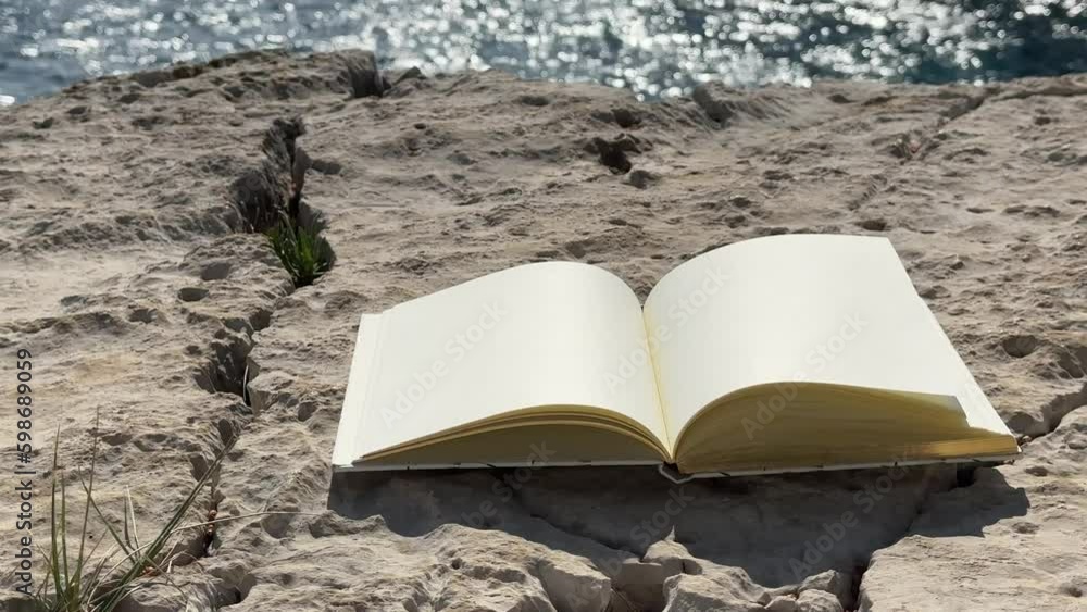 Wind Flipping Notebook Pages on Sea background Generative AI Wind Flipping Notebook Pages on Sea background Generative AI