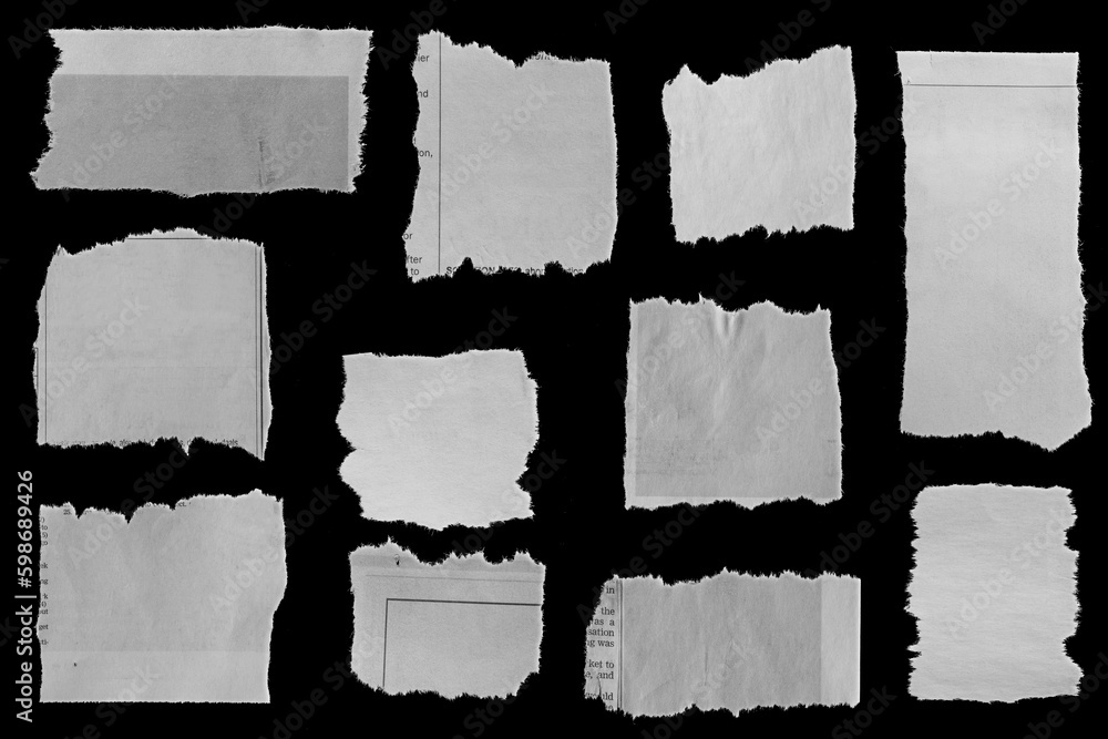 Torn papers on black