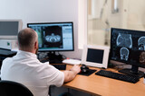 the patient undergoes computed tomography in the clinic the radiologist monitors the procedure and the results of the scan