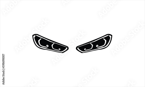 Car headlights pair on white