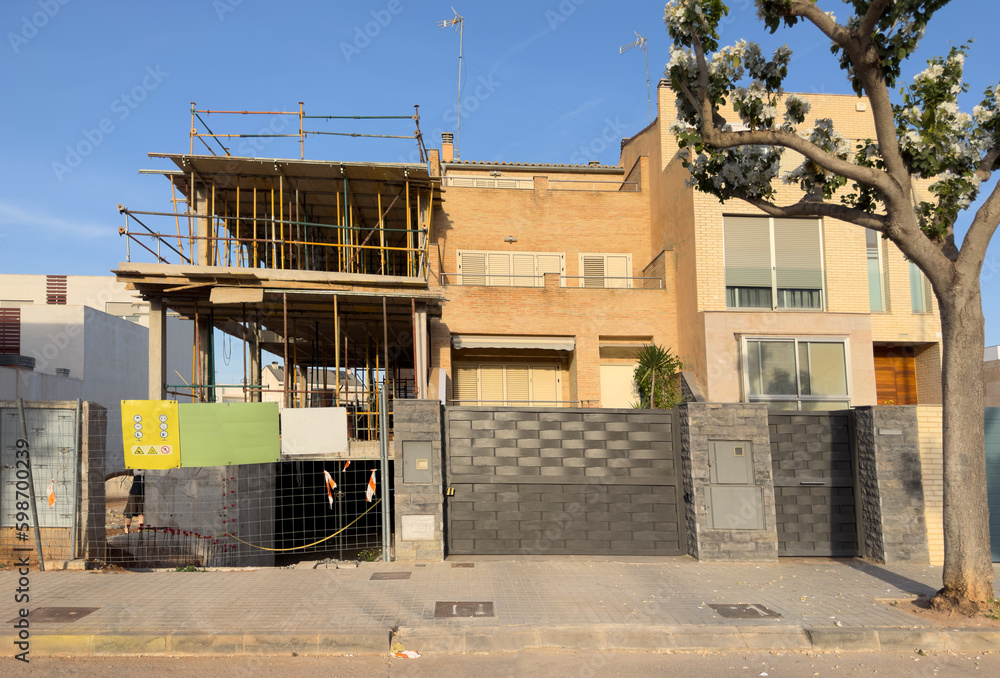 Villa under construction. Townhouse on Construction site. Luxury villa under construction near beach of Mediterranean sea. Construction of modern house near coastline. Home renovation near ocean. Villa under construction. Townhouse on Construction site. Luxury villa under construction near beach of Mediterranean sea. Construction of modern house near coastline. Home renovation near ocean.