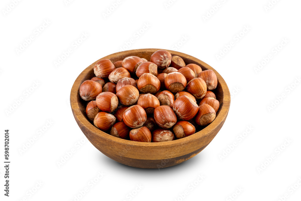 In shell hazelnuts bowl. 45 degree studio shoot isolated on white background. In shell hazelnuts bowl. 45 degree studio shoot isolated on white background.