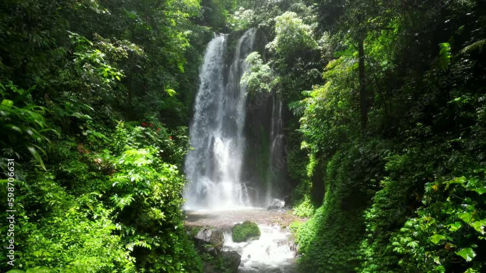 Labuhan Kebo waterfall. Labuhan Kebo waterfall is a beautiful multi tier stream situated in a lush green valley. Labuhan Kebo waterfall. Labuhan Kebo waterfall is a beautiful multi tier stream situated in a lush green valley.