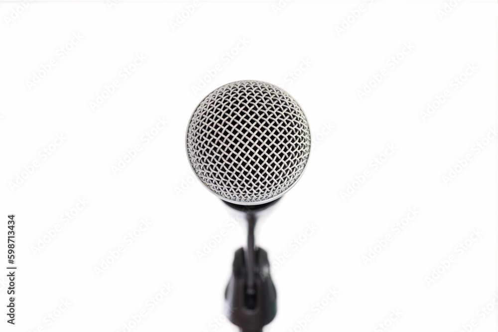 close front view of a profosssionnal microphone isolated on white background close front view of a profosssionnal microphone isolated on white background