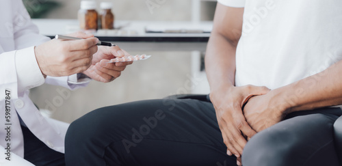 Cuadro en lienzo Man having appointment with STD specialist in clinic, closeup