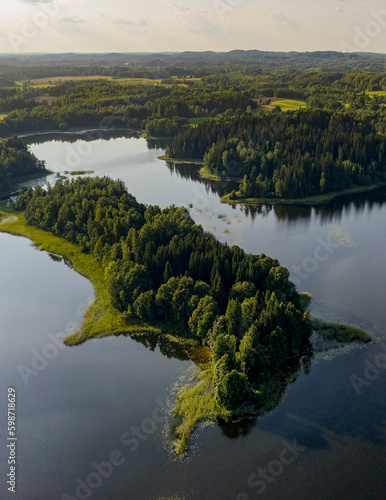 Eša ezer[3] or Ežezer (also Jēša ezer, Ješa ezer, Ješezer, Eža ezer) is a lake in Ezernieki and Andzeļu parishes of Krāslava county. The lake with the most islands in Latvia and even in the whole Balt photo