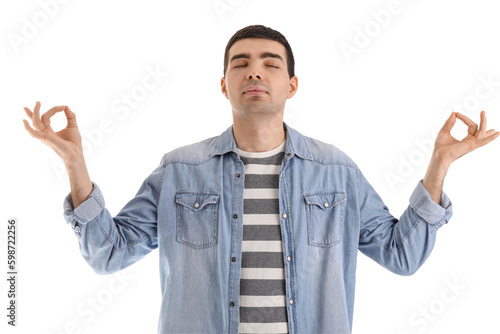 Young man meditating on white background. Balance concept