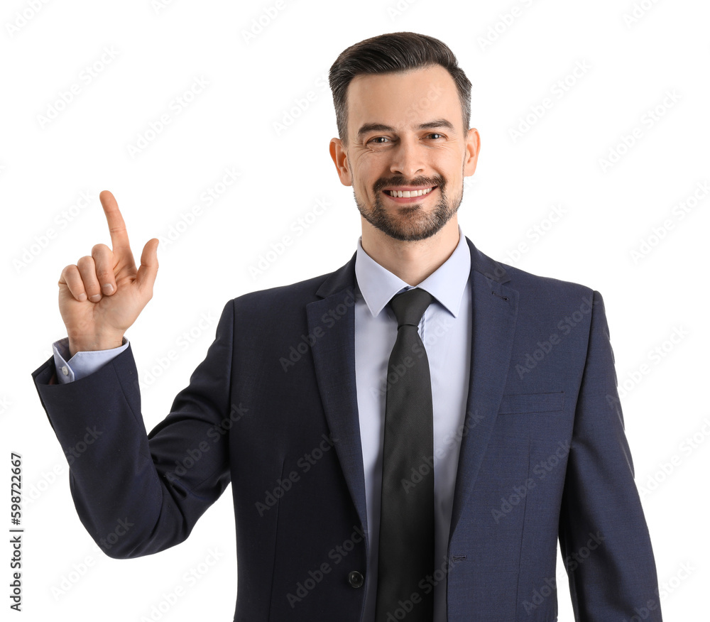 Handsome businessman pointing at something on white background Handsome businessman pointing at something on white background