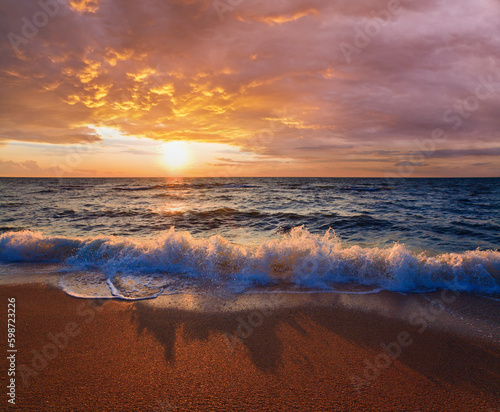 Sea  sunset surf great wave break on sandy coastline © wildman