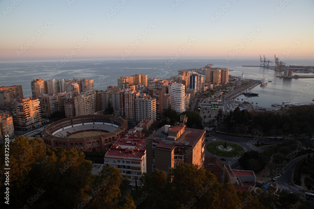 Fototapeta premium view over Malaga at sunset travel banner