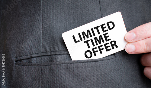 Card with LIMITED TIME OFFER text in pocket of businessman suit. Investment and decisions business concept.