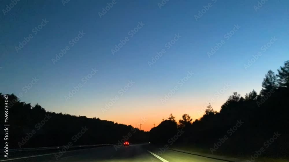 Timelapse of a road in sunset Timelapse of a road in sunset