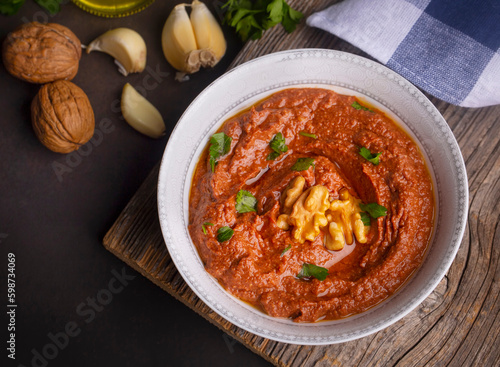 Traditional delicious Turkish appetizer, Muhammara, healthy walnut and roasted red bell pepper dip