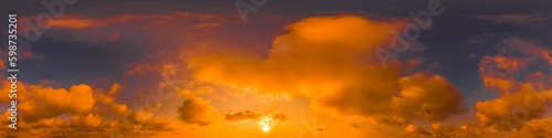 Blue Orange evening sky seamless panorama spherical equirectangular 360 degree view with Cumulus clouds, setting sun. Full zenith for use in 3D graphics, game and aerial drone panoramas as sky