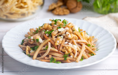 Turkish Noodle / Eriste with cheese, walnuts and parsley.