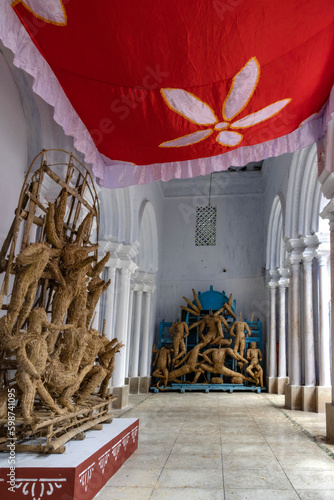 Incomplete Goddess Durga idol at the Thakur Dalan or Family Temple of a old Zamindar or Jamindar house, few days before the Durga Puja festival inKolkata, West Bengal, India.