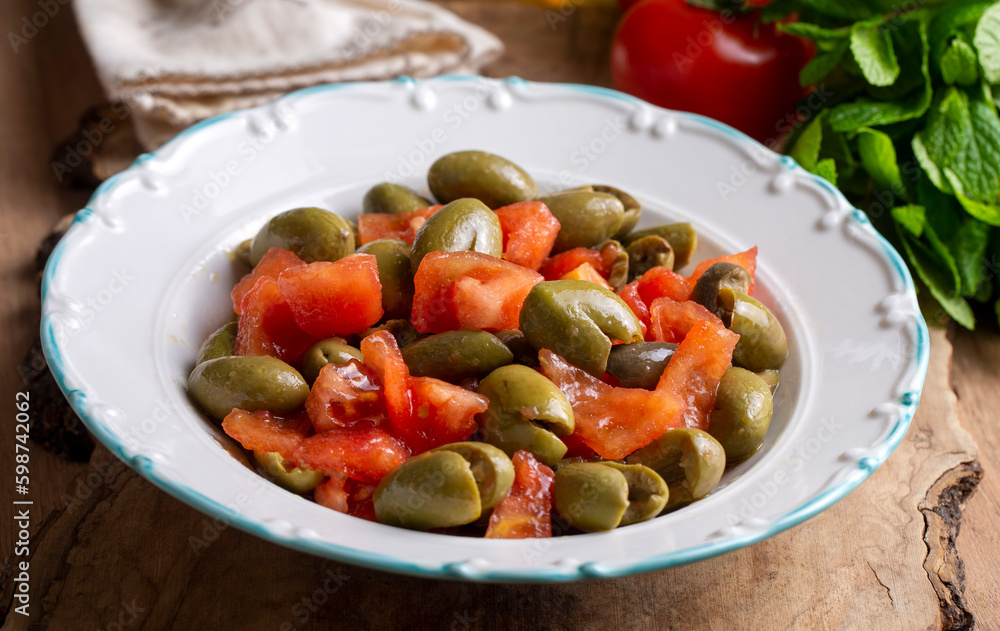 Gourmet flavors from traditional Turkish cuisine; green olive salad (Turkish name; Kirma yesil zeytin salatasi) A flavor belonging to the Turkey - Antakya region. Gourmet flavors from traditional Turkish cuisine; green olive salad (Turkish name; Kirma yesil zeytin salatasi) A flavor belonging to the Turkey - Antakya region.