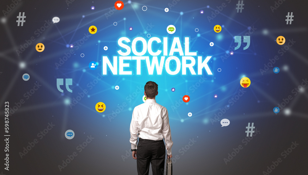 Rear view of a businessman, social media concept Rear view of a businessman, social media concept