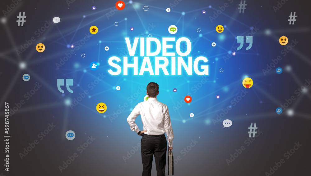 Rear view of a businessman, social media concept Rear view of a businessman, social media concept