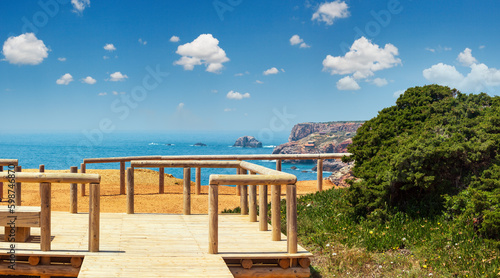 Wooden paths and observation decks on summer Atlantic rocky coast