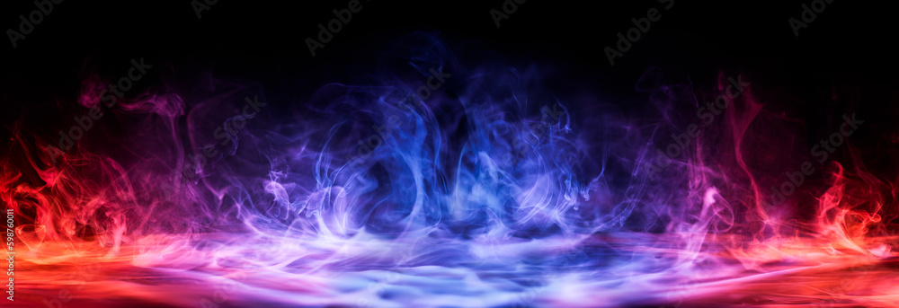 Fototapeta premium Dramatic smoke and fog in contrasting vivid red, blue, and purple colors. Vivid and intense abstract background or wallpaper.