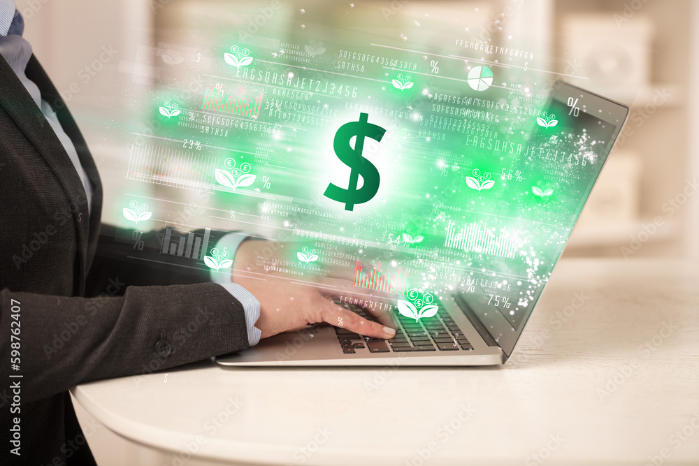 Young man watching stock market on laptop Young man watching stock market on laptop