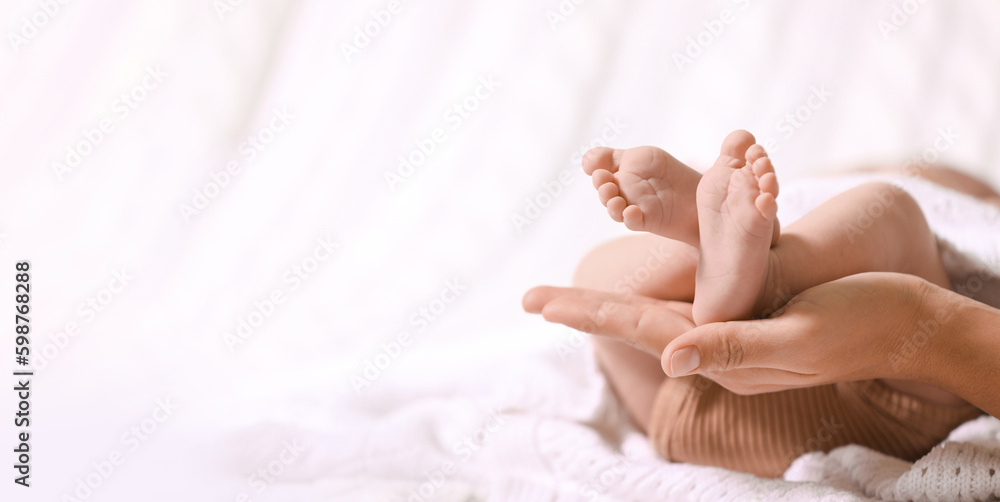 Mother and her baby baby on white knitted blanket, closeup. Banner design with space for text Mother and her baby baby on white knitted blanket, closeup. Banner design with space for text