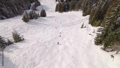 Whistler mountain Creekside ski hill at sunset, aerial footage, sunset, winter, ski hill. 5.4k 24fps photo