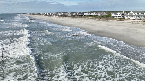 Beautiful coastal South Carolina with vacation beach houses and breaking waves at Pawleys Island South of Myrtle Beach