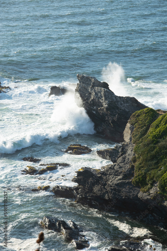 waves crashing on rocks