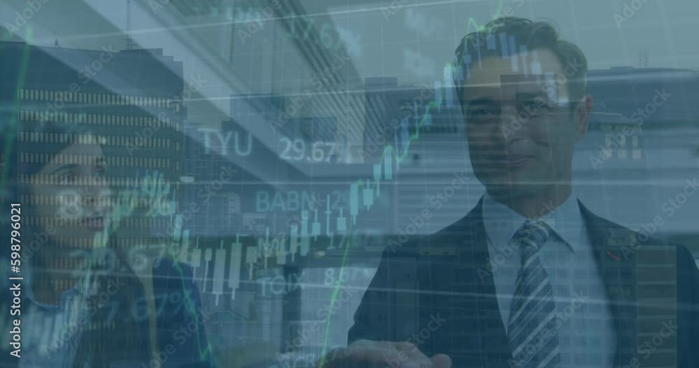 Animation of stock market data processing over caucasian businessman and businesswoman discussing Animation of stock market data processing over caucasian businessman and businesswoman discussing