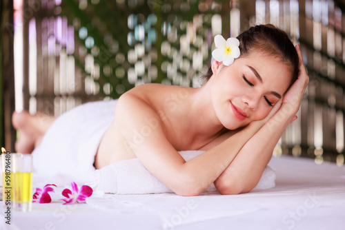 woman having massage in the spa salon  beauty  health care body skin natural herbs and essential oils treatment. concept 
